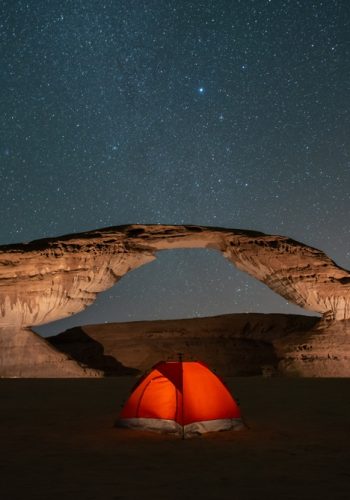 Stars,Motion,In,Rainbow,Arch,Night,Camping,Tent,,With,Beautiful